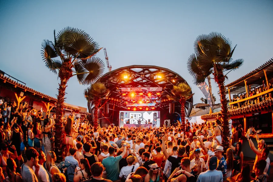 Outdoor stage with palm trees